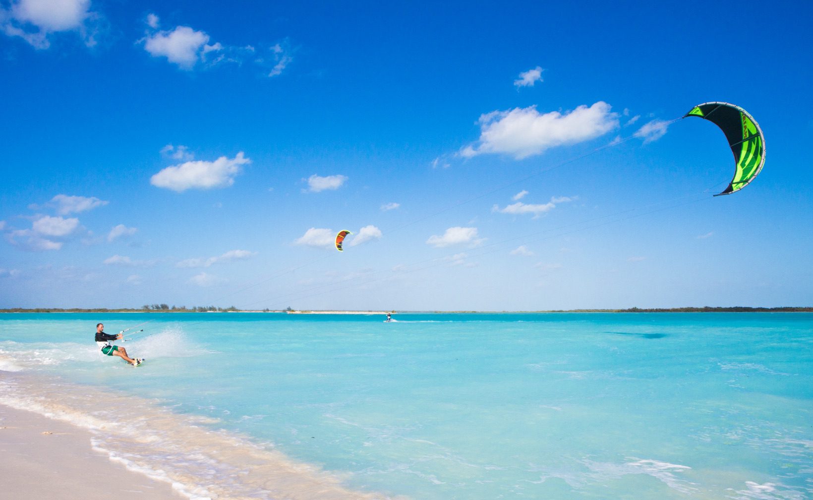 Find your adventure in Cooper Jack Bay. Reserve your own kiteboard for free from The Strand Beach Club.