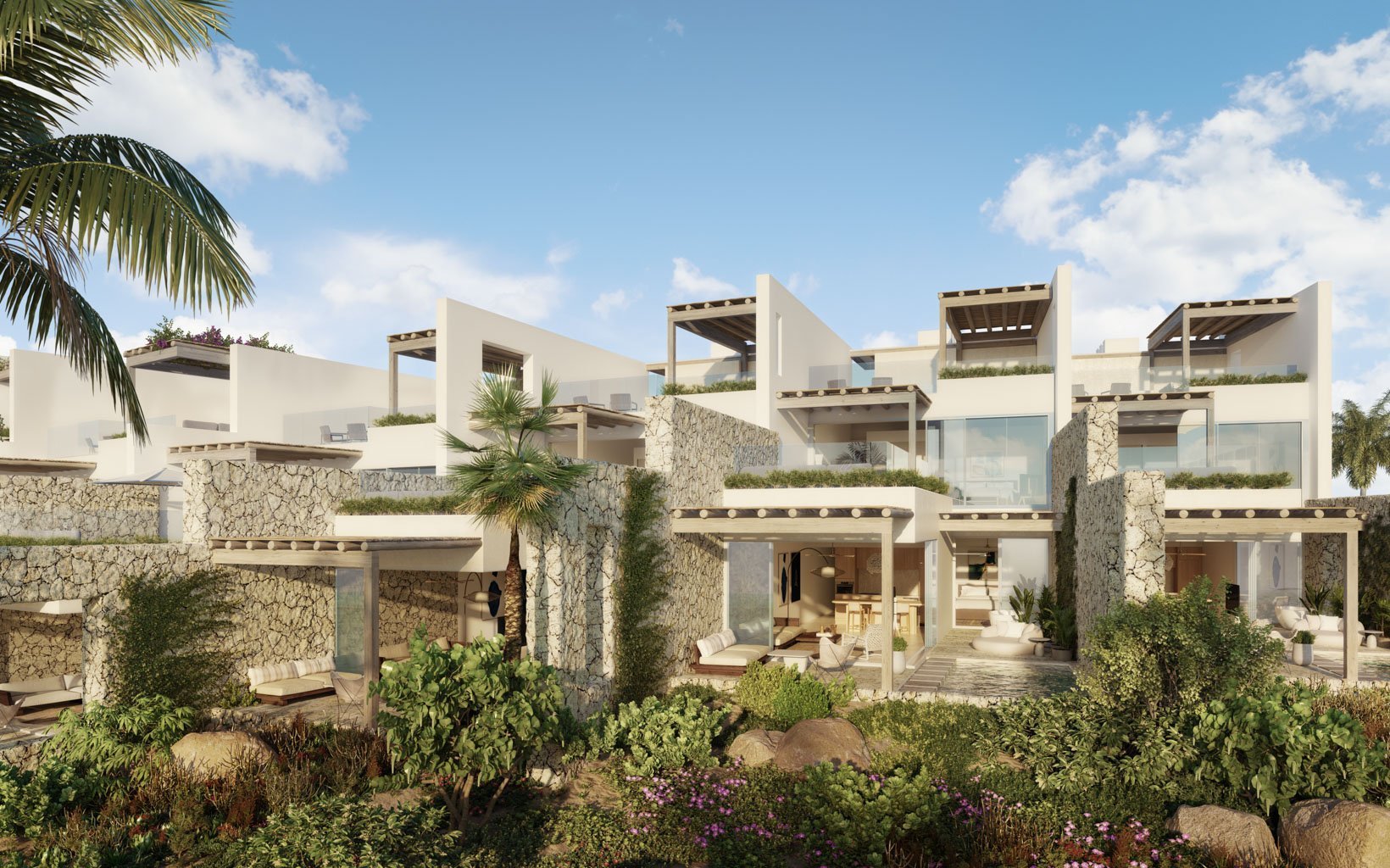 The Strand Turks and Caicos - exterior view of Luxury Residences with lush landscaping