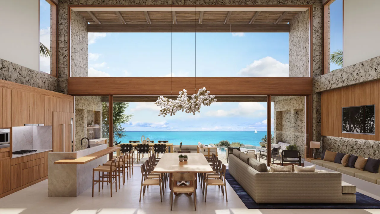 The Strand Turks and Caicos - beautiful entertaining space with kitchen, dining table and seating area in the Luxury Residence